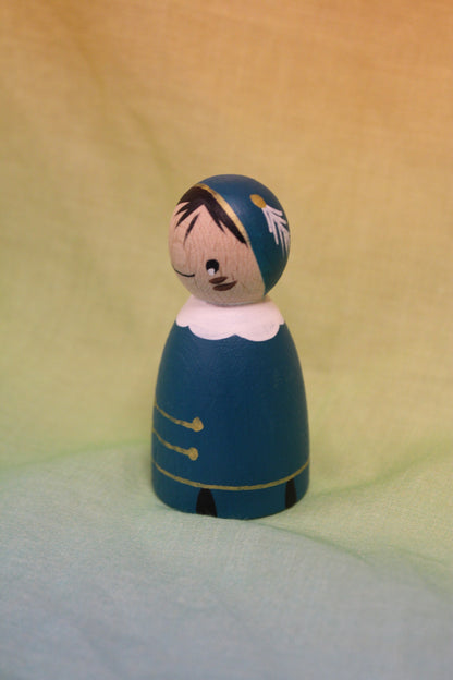 Pegdoll piet fel donker tuquoise